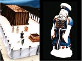 The priests with a lamb and bullock ready for sacrifice by the Altar of Burnt Offering in a model of Moses` Tabernacle in the Wilderness, and a close-up of the High Priest wearing his Ephod and ceremonial clothing. 